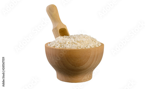 arborio risotto short grain rice in wooden bowl and scoop isolated on white background. nutrition. bio. natural food ingredient.