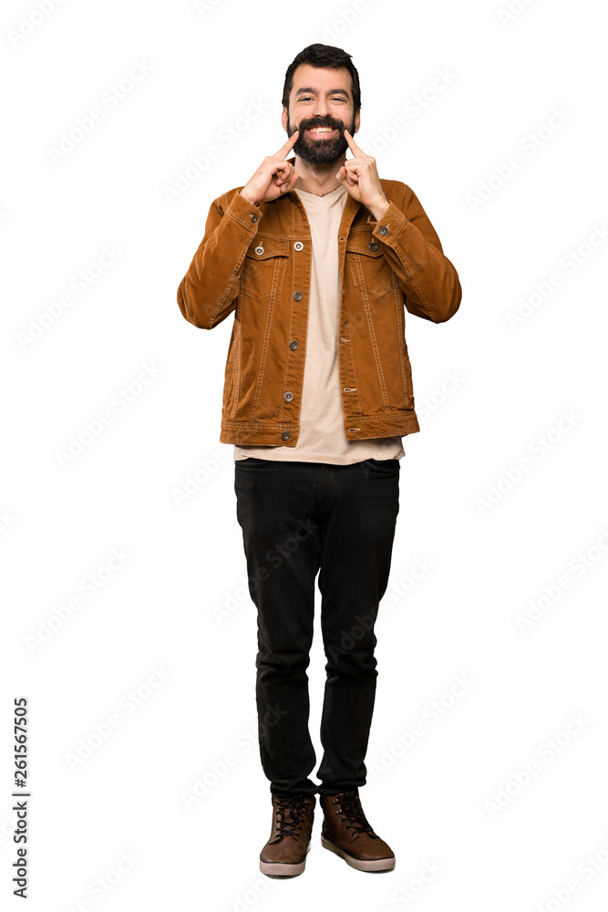 Handsome man with beard smiling with a happy and pleasant expression over isolated white background Handsome man with beard smiling with a happy and pleasant expression over isolated white background