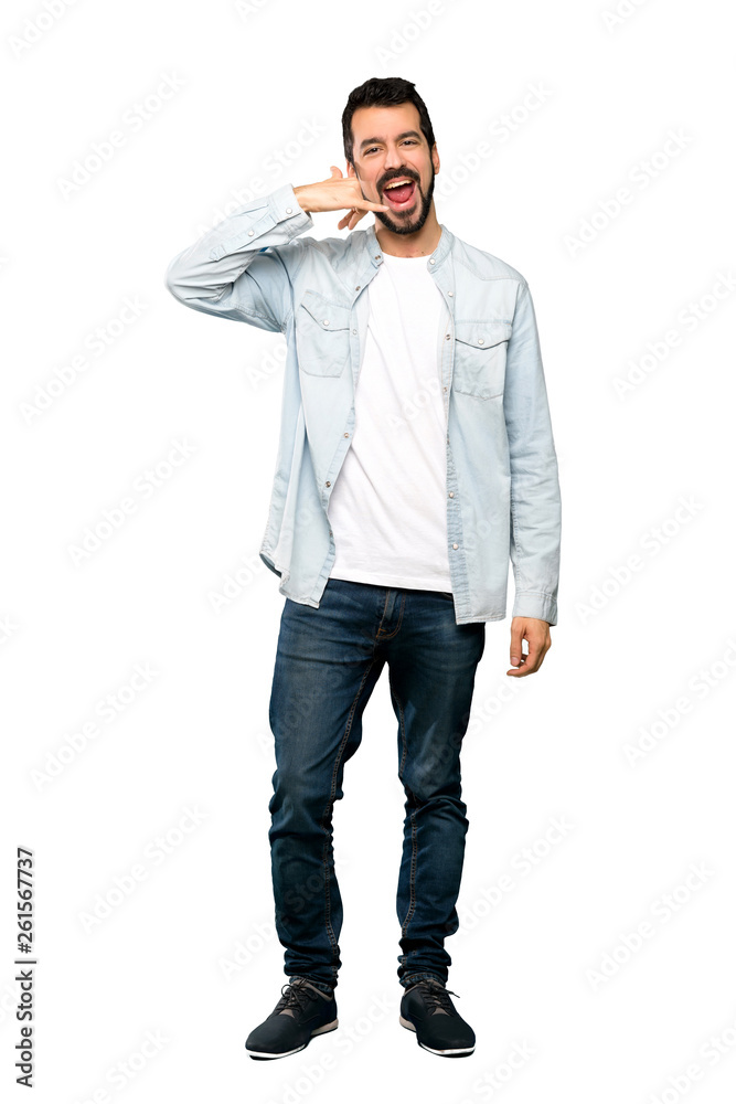 Full-length shot of Handsome man with beard making phone gesture. Call me back sign over isolated white background Full-length shot of Handsome man with beard making phone gesture. Call me back sign over isolated white background
