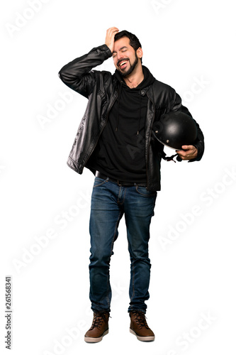 Full-length shot of Biker man has realized something and intending the solution over isolated white background