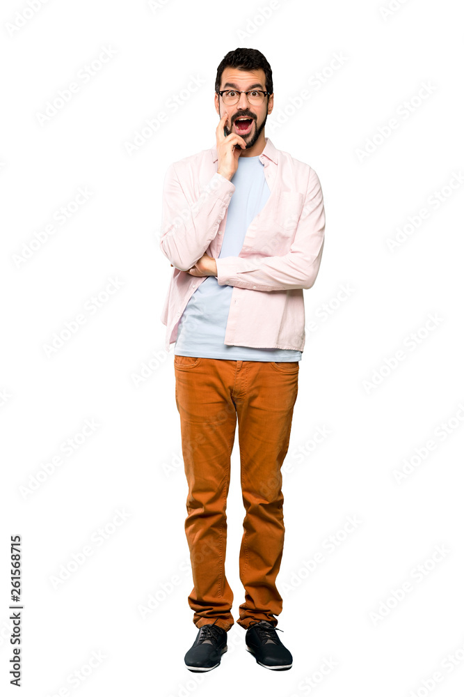 Full-length shot of Handsome man with beard with surprise and shocked facial expression over isolated white background Full-length shot of Handsome man with beard with surprise and shocked facial expression over isolated white background