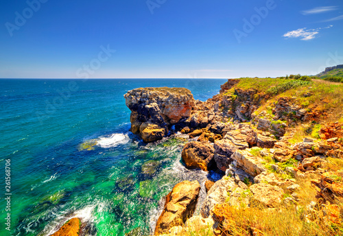 Stunningly beautiful landscape with rocky shore and blue sea