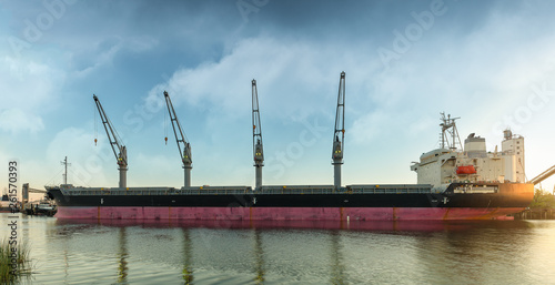 Panoramic view of a ship waiting to be loaded at the Port of Sacramento. photo