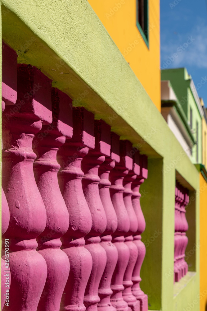 Detailed photo of buildings in the Malay Quarter, Bo Kaap, Cape Town, South Africa. Historical area of brightly painted houses in the city centre occupied largely by the Moslem community.