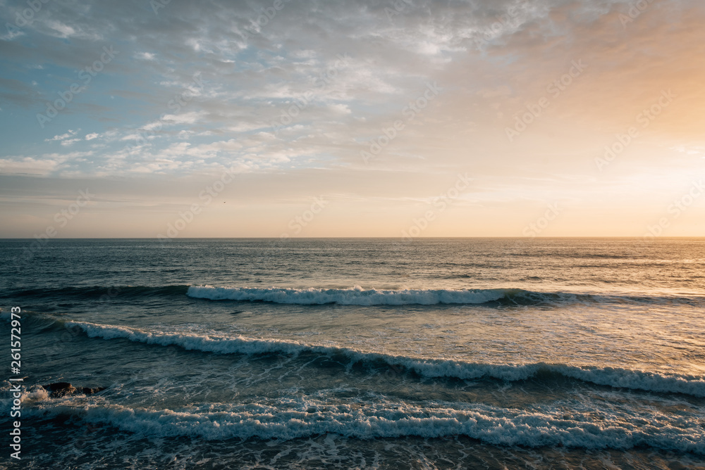 Waves in the Pacific Ocean at sunset, at Pearl Street Beach in Laguna Beach, Orange County, California