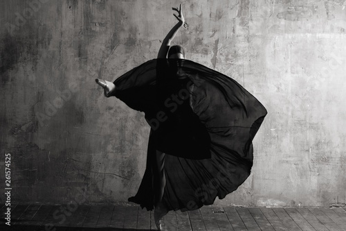 Ballerina in ballroom. Ball...
