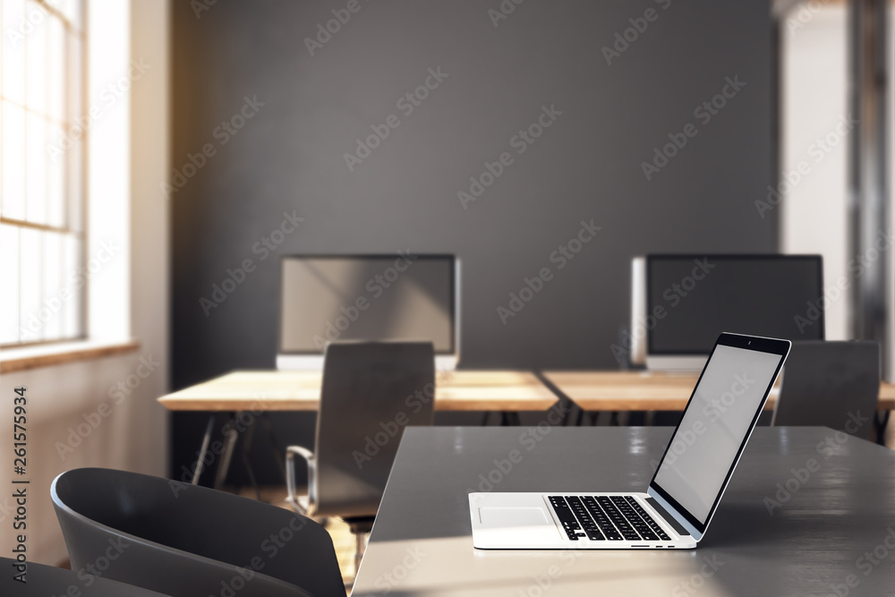Table with laptop in meeting room Table with laptop in meeting room