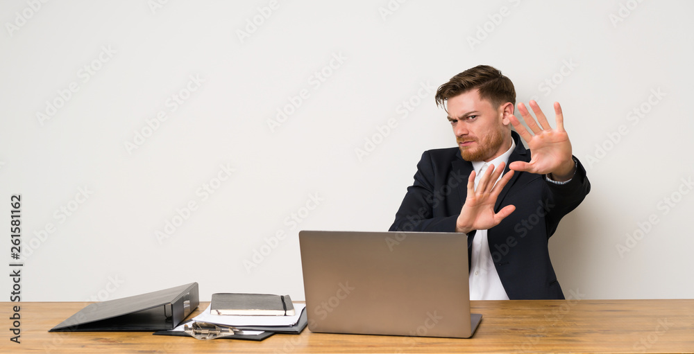 Businessman in a office nervous stretching hands to the front Businessman in a office nervous stretching hands to the front