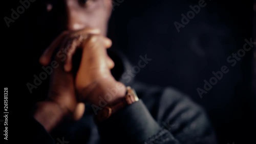 Wallpaper Mural Thoughtful worried american african man thinking in the dark-change of focus Torontodigital.ca