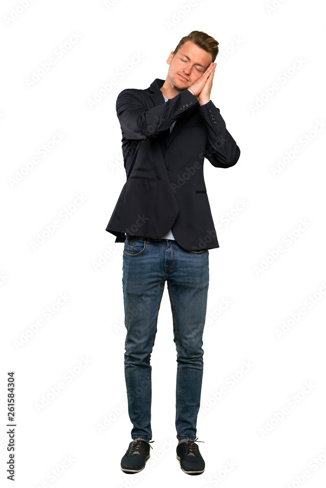 Blonde handsome man making sleep gesture in dorable expression Blonde handsome man making sleep gesture in dorable expression