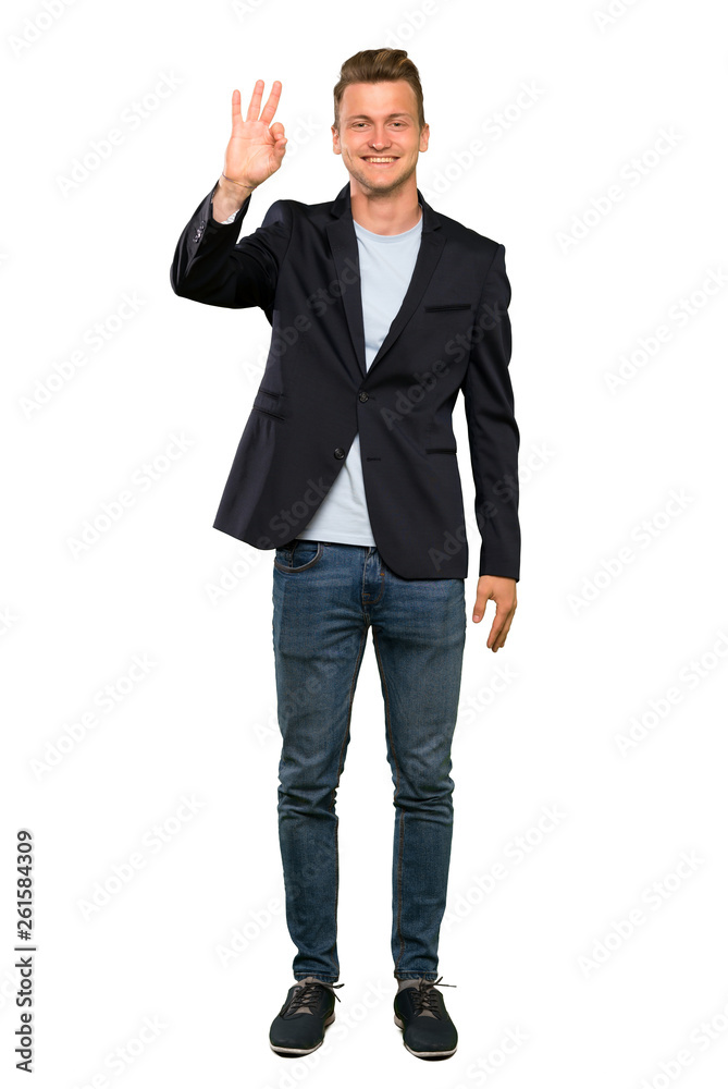 Blonde handsome man happy and counting three with fingers Blonde handsome man happy and counting three with fingers