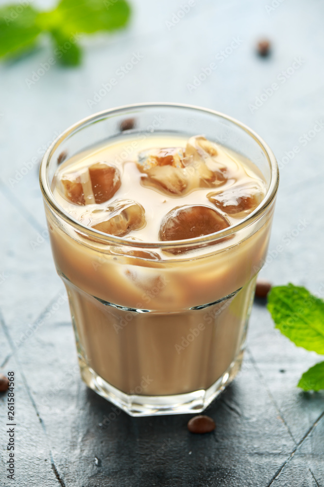 iced latte coffee in a glass with cold milk. Summer drink iced latte coffee in a glass with cold milk. Summer drink