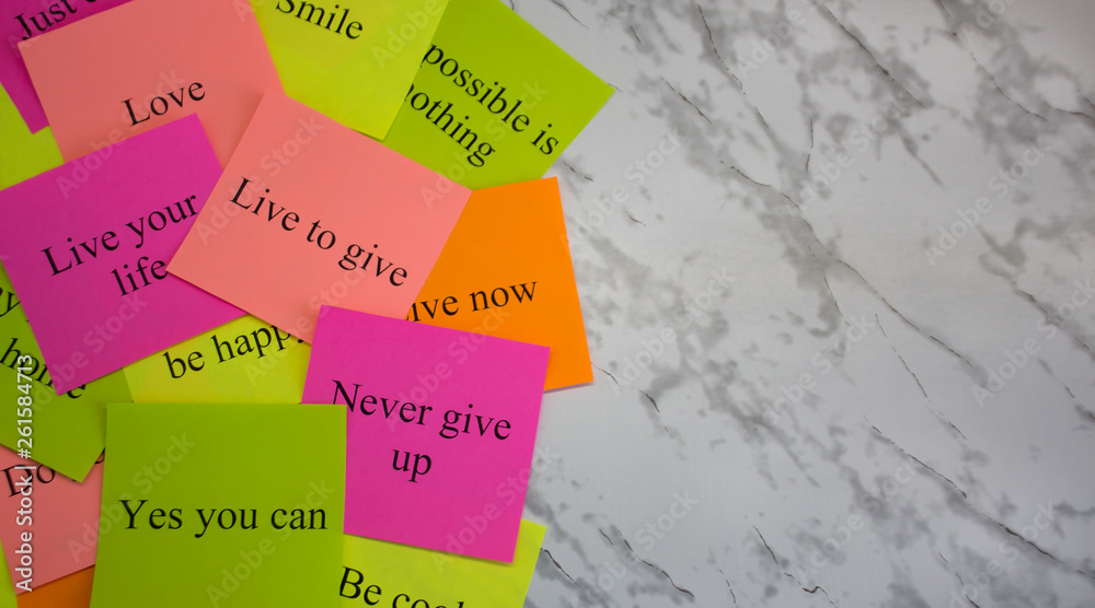 Fototapeta Motivational words on colorful stickers on a marble table. Business plan, strategy, concept, future. Copy space, creativity, project, art. Vision board.