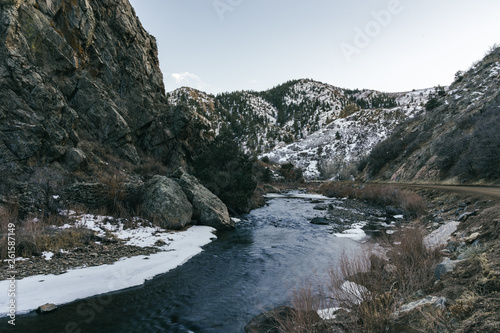 Snowy River and Mountain Scene with trees from a Hike in the Colorado Rocky Mountains