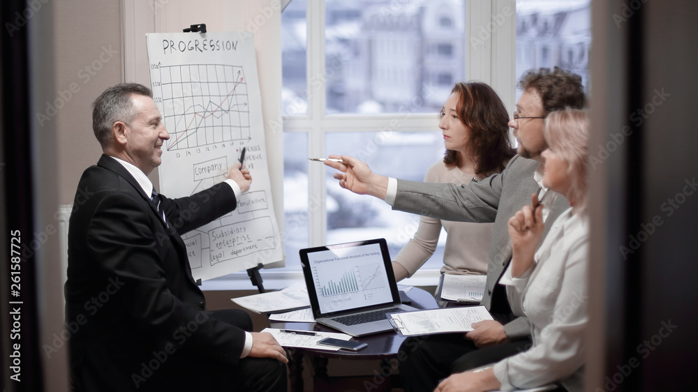 group of senior businessmen discussing a new business project. group of senior businessmen discussing a new business project.