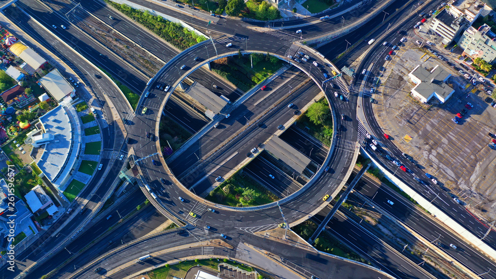 Aerial drone photo of multilevel highway junction urban ring crossing road during rush hour