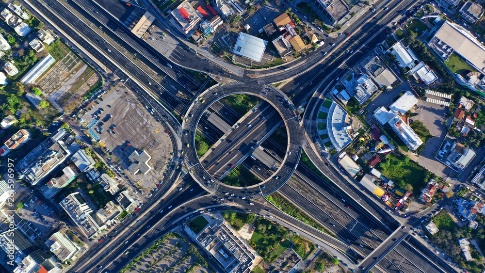 Aerial drone photo of multilevel highway junction urban ring crossing road during rush hour Aerial drone photo of multilevel highway junction urban ring crossing road during rush hour