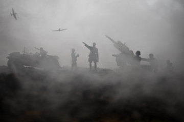 An anti-aircraft cannon and Military silhouettes fighting scene on war fog sky background. Allied air forces attacking on German positions. Artwork decorated scene.