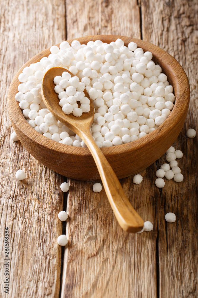 Tapioca balls a product of tapioca, a starch extracted from the cassava root  closeup in a bowl. vertical Stock Photo | Adobe Stock