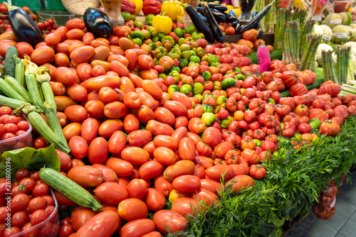 Organic tomatoes on the counter. Italian food market.