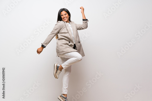 Young Colombian girl jumping