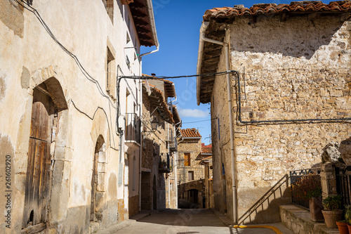 street with typical houses in Puertomingalvo village  province of Teruel  Aragon  Spain