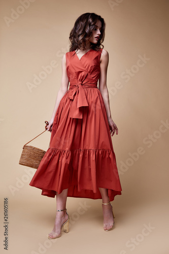 Pretty beautiful sexy elegance woman skin tan body fashion model glamor pose wear trend dress casual clothes party summer collection makeup hair style brunette success accessory jewelry studio.