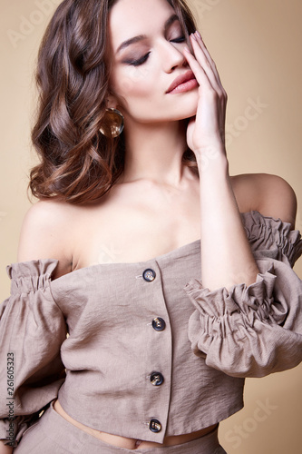 Portrait of beautiful sexy woman perfect face cosmetic skin care beauty salon hairdo hair style model blush mascara lipstick glamor collection accessory jewelry earrings cream young pure lotion nail.