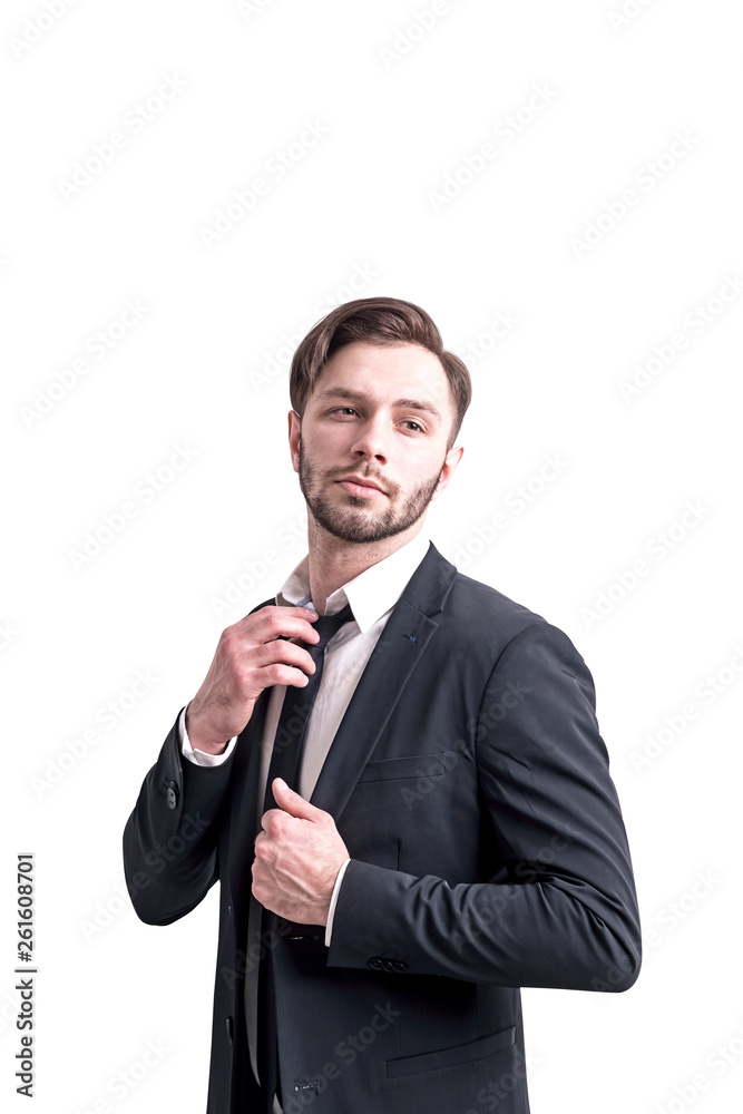 Confident businessman fixing tie Confident businessman fixing tie