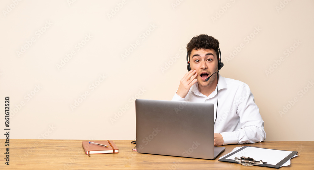 Telemarketer man with surprise and shocked facial expression Telemarketer man with surprise and shocked facial expression