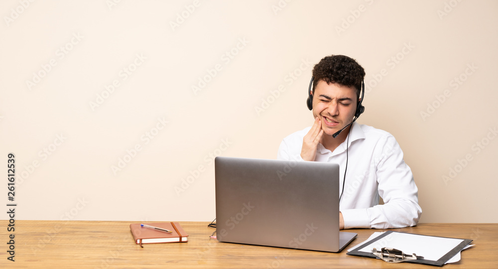 Telemarketer man with toothache Telemarketer man with toothache