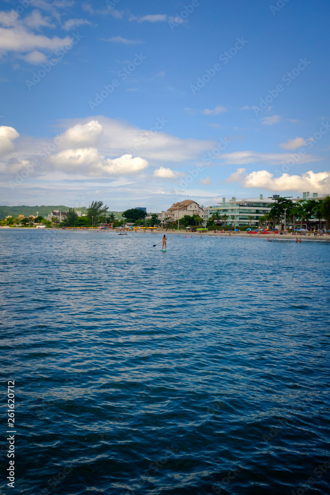 Woman practicing Stand Up paddle boarding