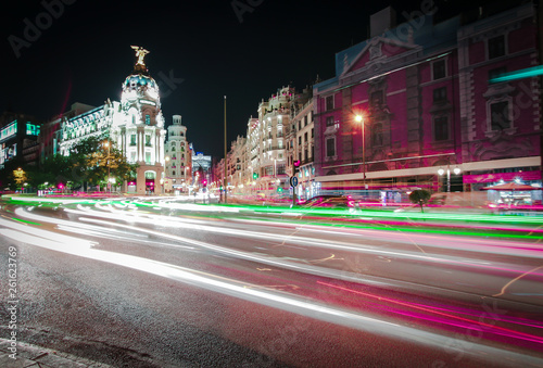 Rays of traffic lights on Gran via street, main shopping street in Madrid at night. Spain, Europe © Diego