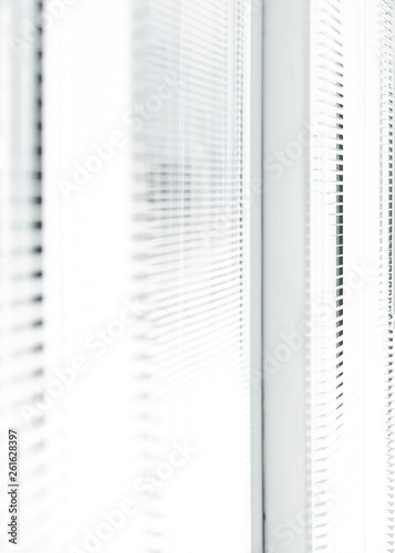 window with blinds in a modern office on a bright Sunny day