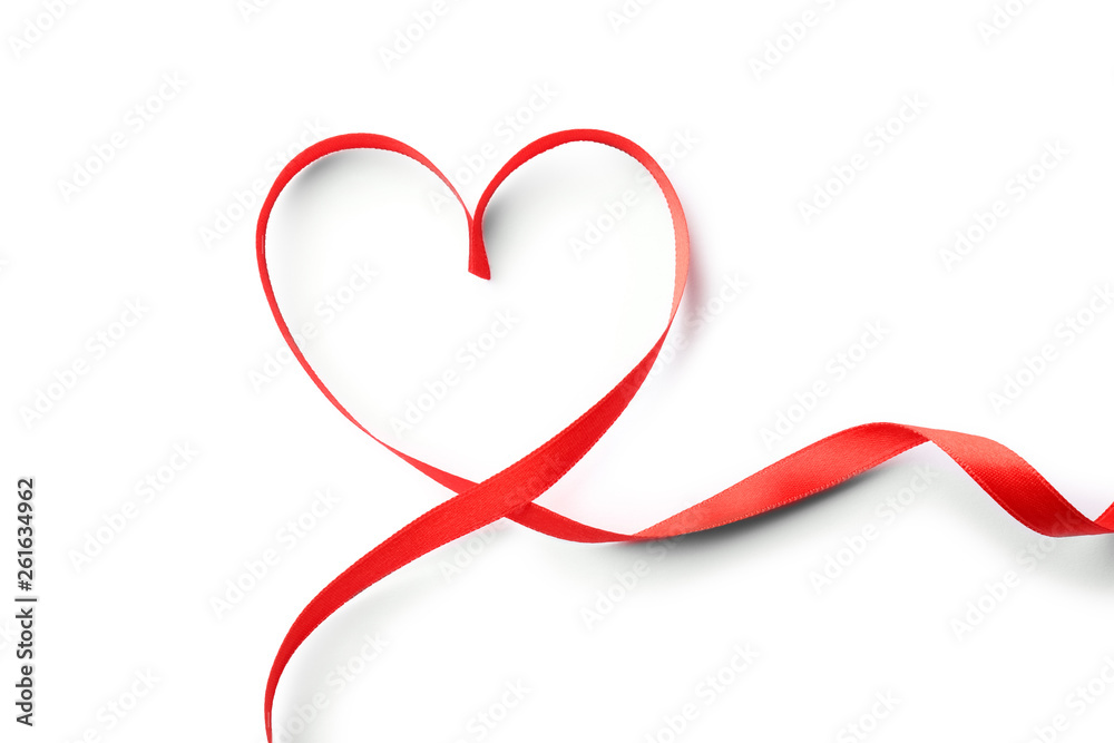 Heart made of red ribbon on white background, top view. Festive decoration Heart made of red ribbon on white background, top view. Festive decoration