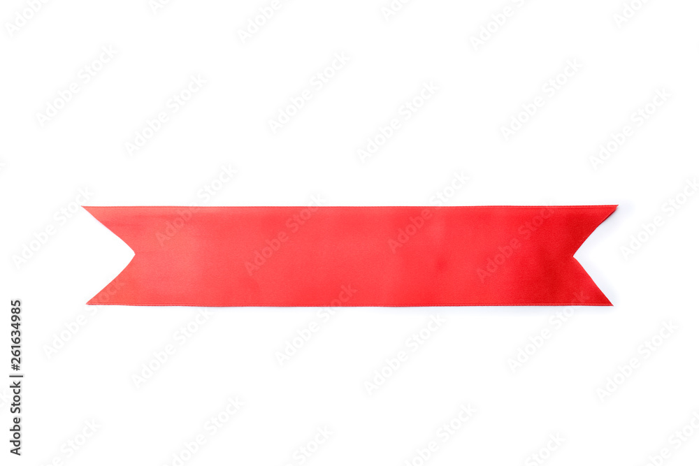 Simple red ribbon on white background, top view. Festive decoration Simple red ribbon on white background, top view. Festive decoration