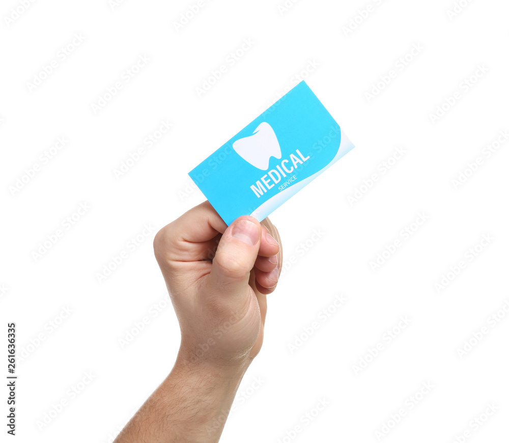 Man holding business card isolated on white, closeup. Dental medical service Man holding business card isolated on white, closeup. Dental medical service