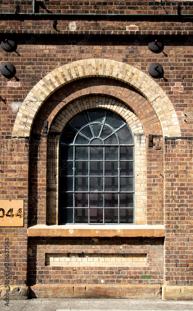 window in brick wall