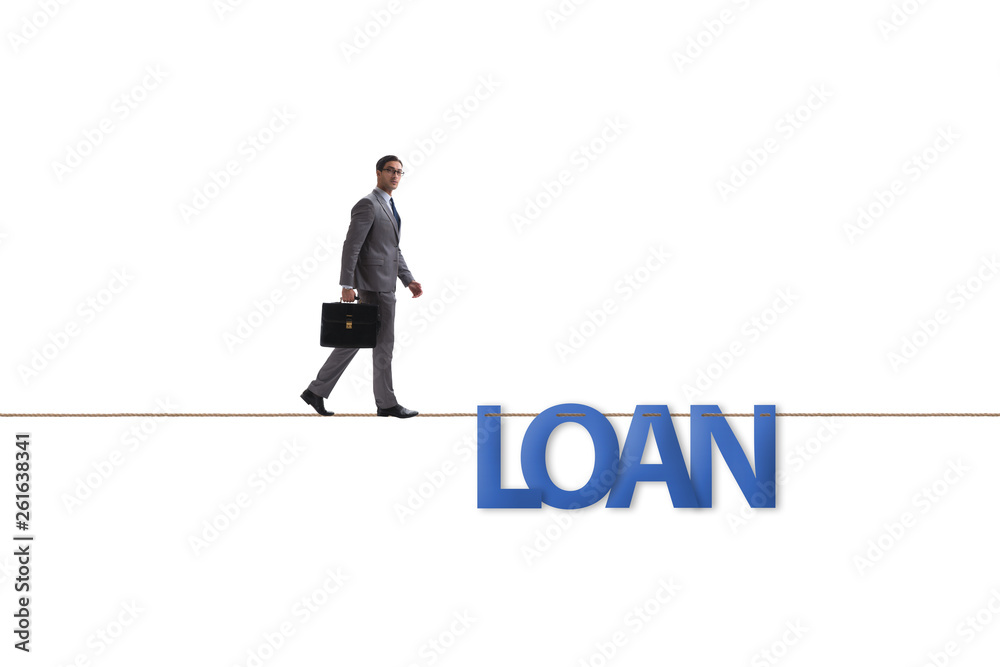 Debt and loan concept with businessman walking on tight rope