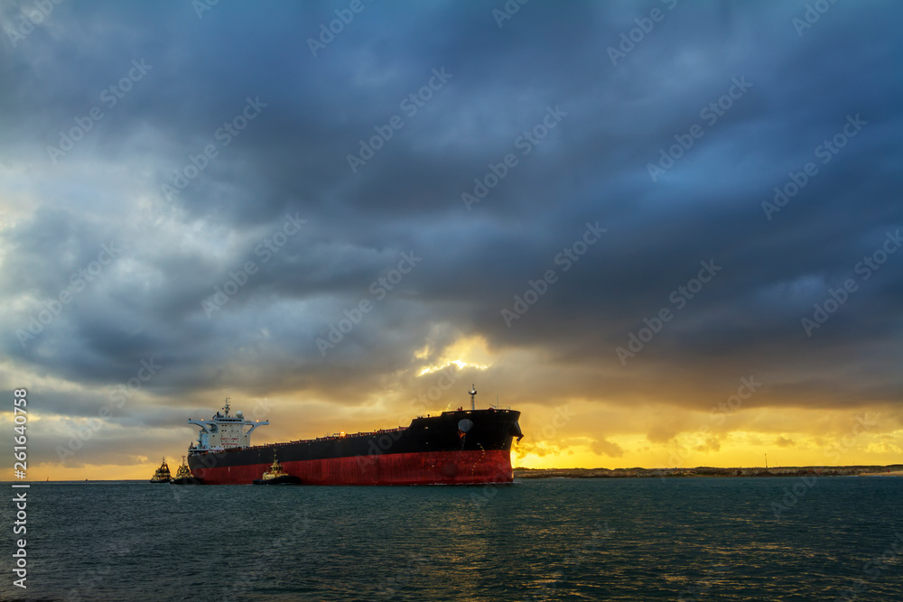 Cargo ship Newcastle Harbour at Dawn, Newcastle, NSW, Australia
