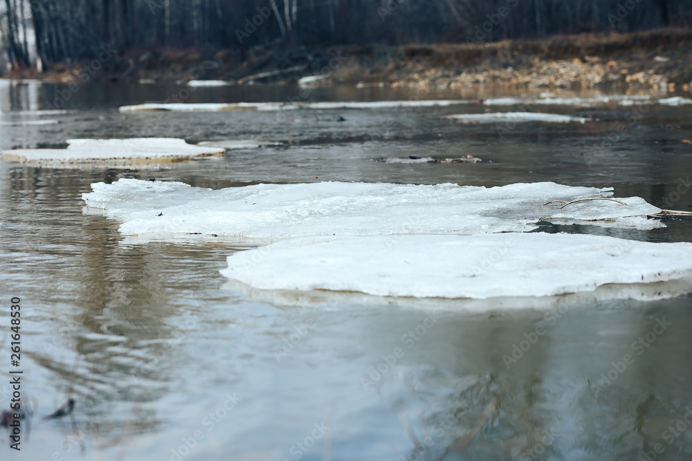 spring in east Kazakhstan landscape snowy mountines and river with ice