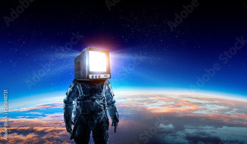 Astronaut with TV head in space. Mixed media.