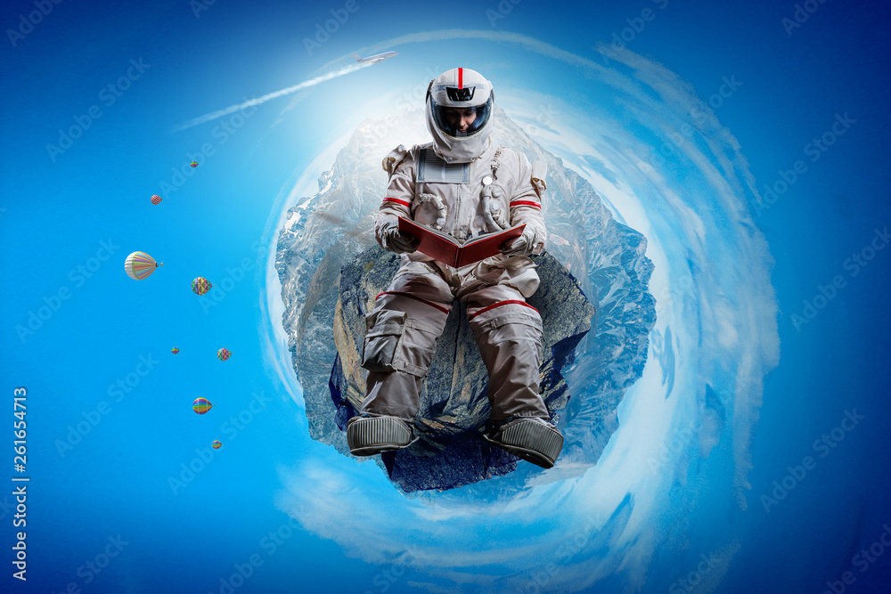 Naklejka premium Spaceman and the planet Earth abstract theme
