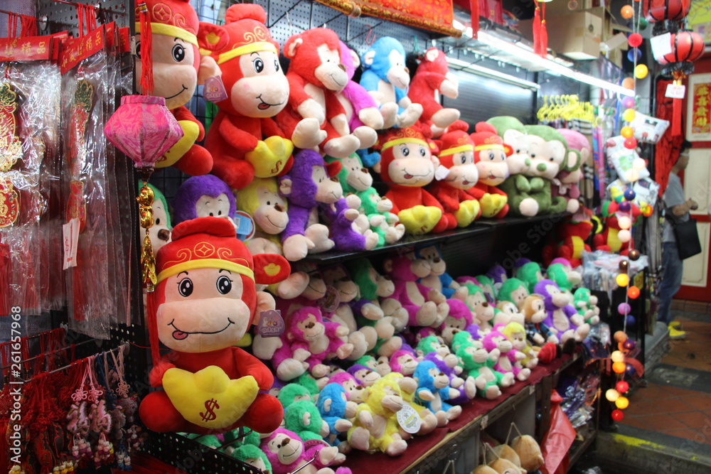 Chinese new year monkey soft toys on display in a street market