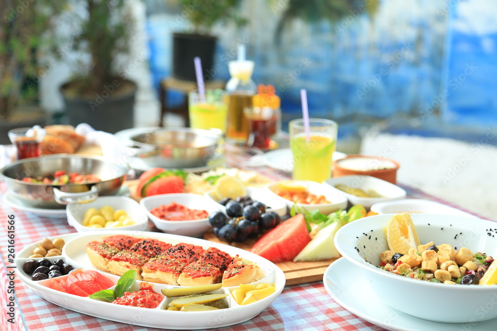 table with food in a restaurant table with food in a restaurant