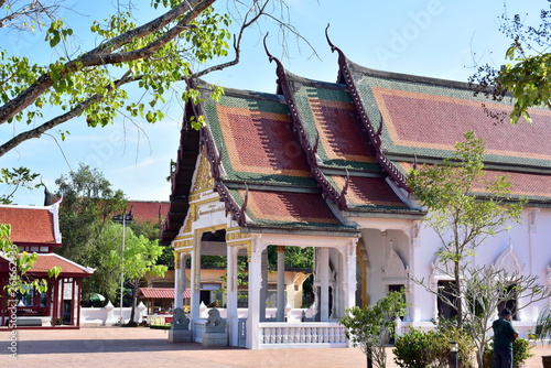 The beauty of Wat Phra Borommathat Chaiya And the old Buddha image At Surat Thani, Thailand photo