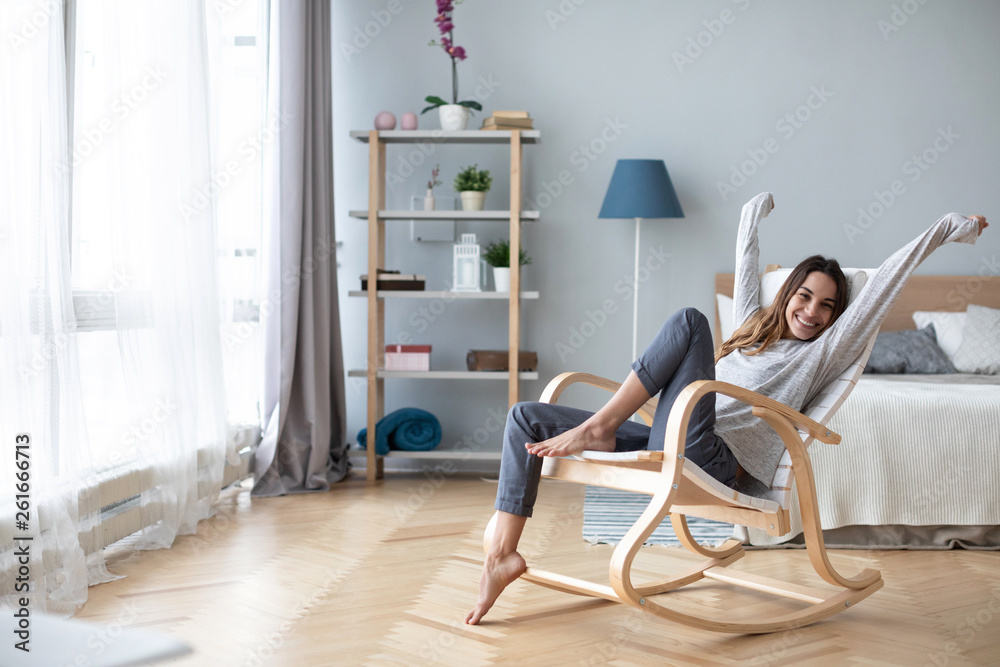Full-length body gorgeous good-looking attractive pretty lady with her beaming smile she stretch oneself indoor cosy modern room. - obrazy, fototapety, plakaty 
