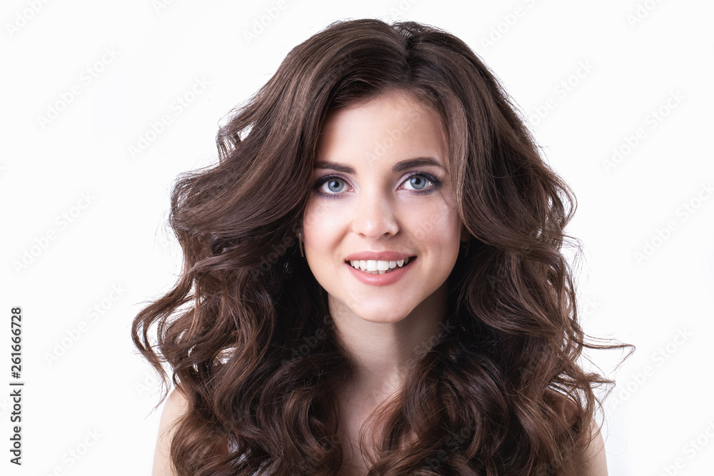 Portrait of a beautiful young woman with curly hair and a perfect smile isolated. Portrait of a beautiful young woman with curly hair and a perfect smile isolated.