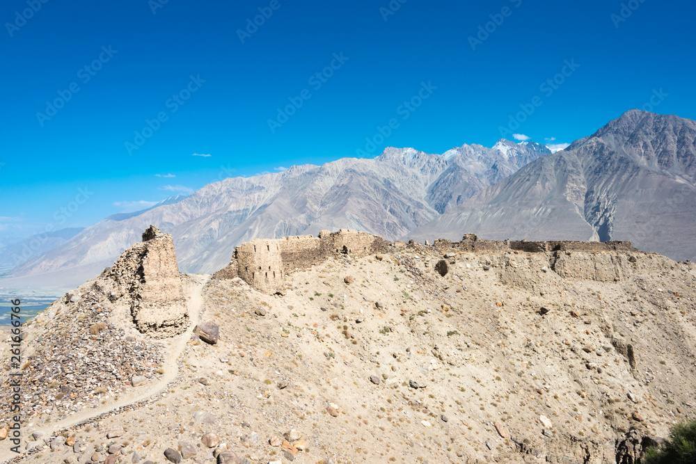 Wakhan Valley, Tajikistan - Aug 22 2018: Ruins of Yamchun Fort in the Wakhan Valley in Gorno-Badakhshan, Tajikistan. It is located in the Tajikistan and Afghanistan border.