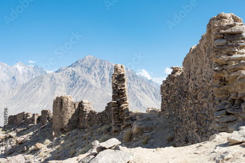 Pamir Mountains, Tajikistan - Aug 22 2018: Ruins of Yamchun Fort in the Wakhan Valley in Gorno-Badakhshan, Tajikistan. It is located in the Tajikistan and Afghanistan border.